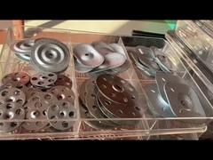 steel plates and fasteners used to attach the TPO EPDM membrane through the insulation to the roof d